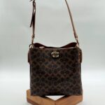 Coach monogram kilitli büzgülü kahve taba çanta