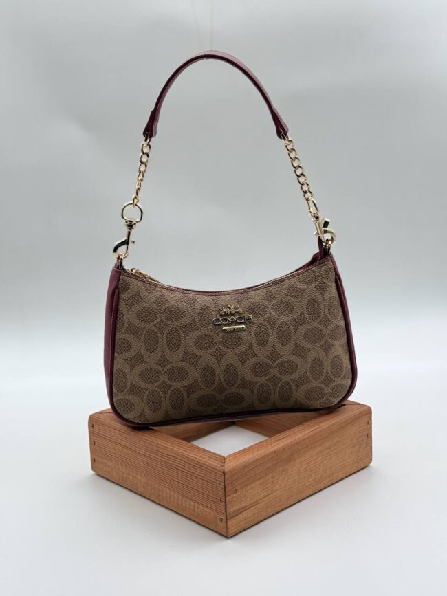 Coach Gofraj baget bordo kum çanta