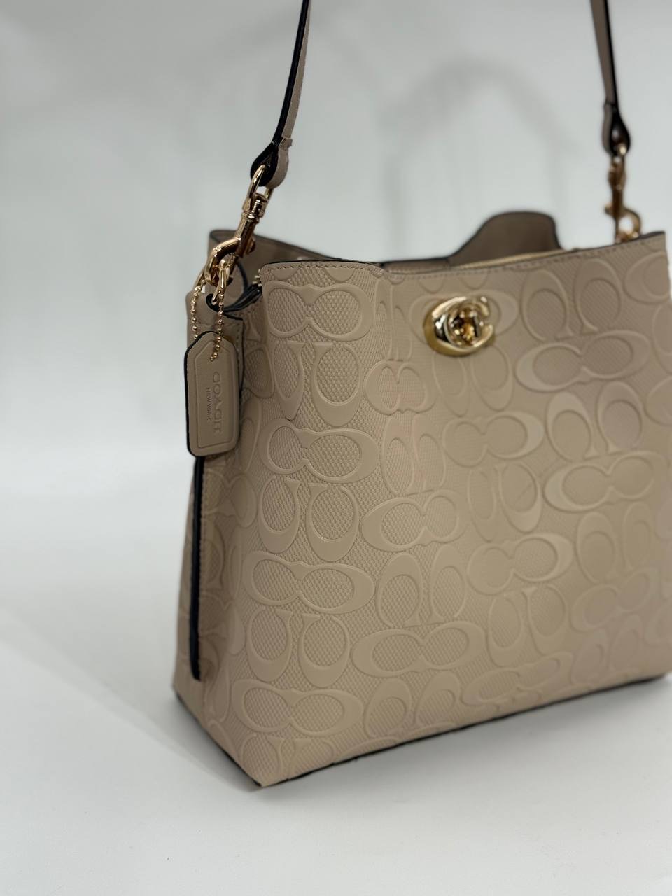 Coach Gofraj baskılı kilitli büzgülü vizon çanta