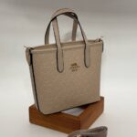 Coach Gofraj orta boy kova vizon çanta