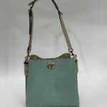 Coach Gofraj baskılı kilitli büzgülü mint yeşili çanta