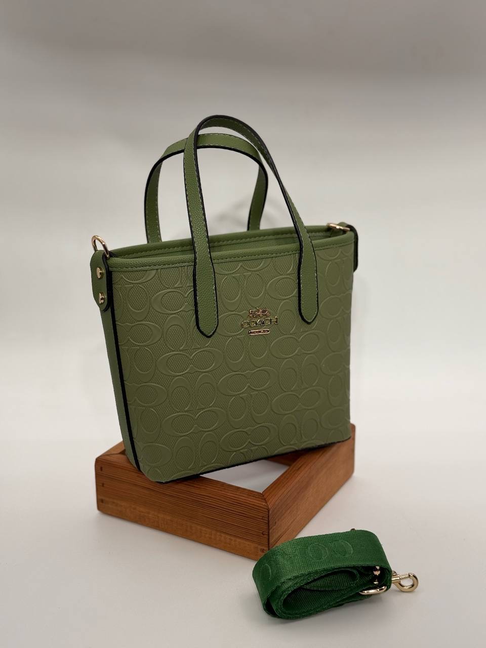 Coach Gofraj orta boy kova yeşil çanta