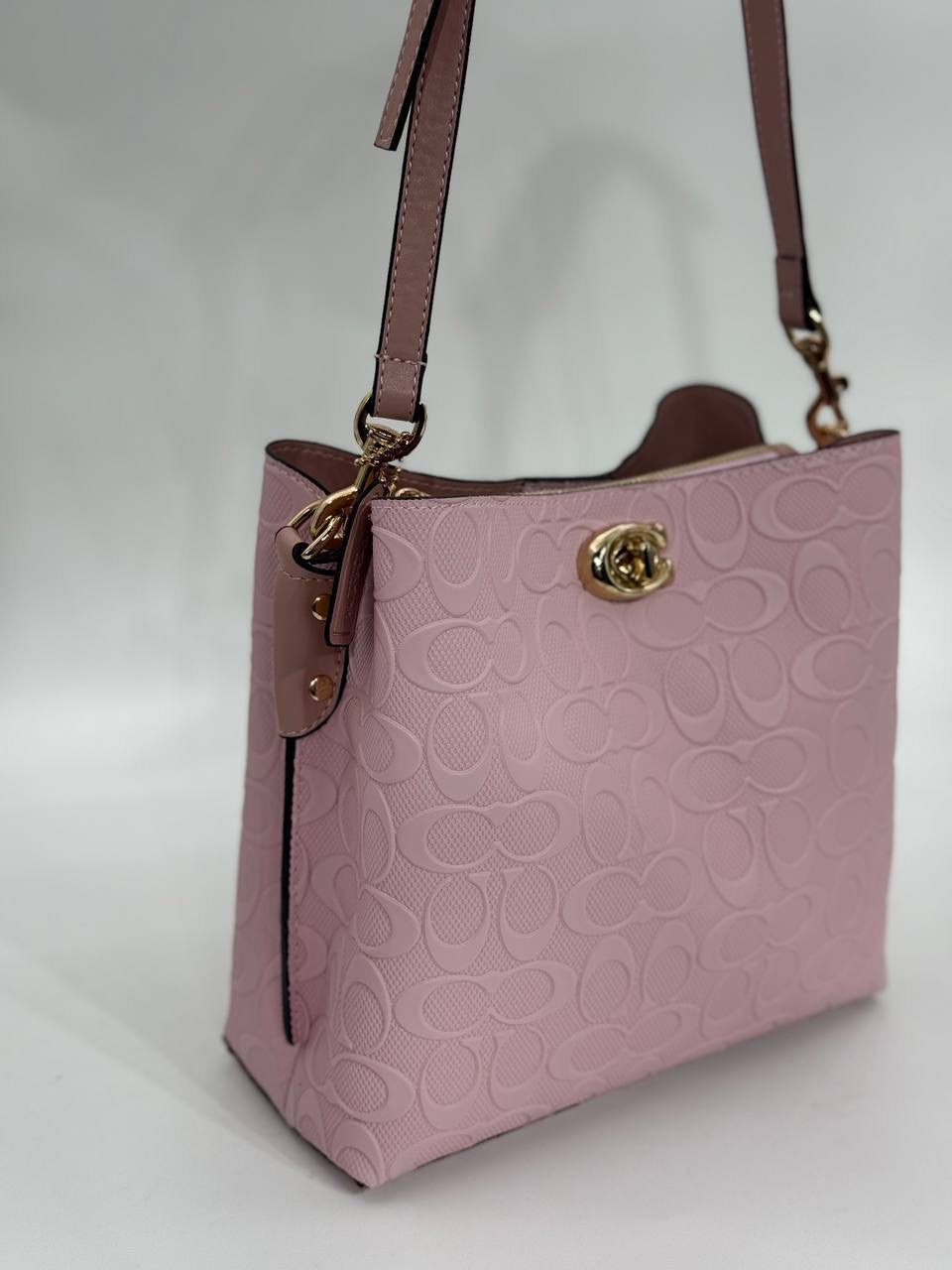 Coach Gofraj baskılı kilitli büzgülü pembe çanta