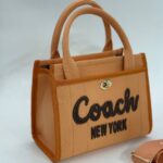 Coach canvas küçük boy turuncu çanta