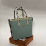 Coach Gofraj orta boy kova mint çanta