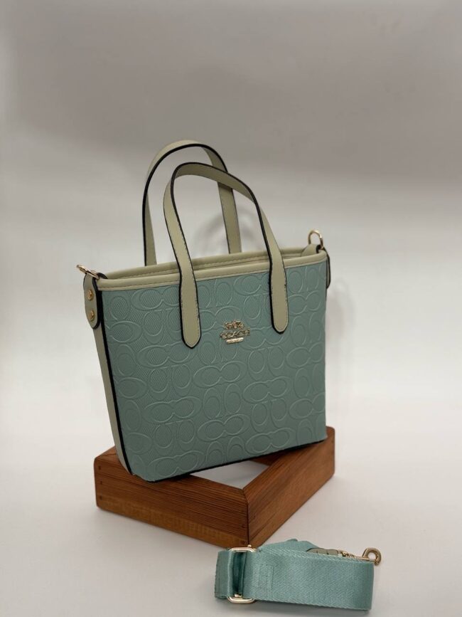 Coach Gofraj orta boy kova mint çanta