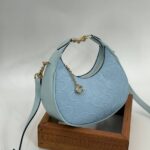 Coach Gofraj ay modeli orta boy mavi çanta