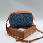 Coach postacı turuncu mavi çanta