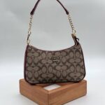 Coach monogram baget bordo vizon çanta