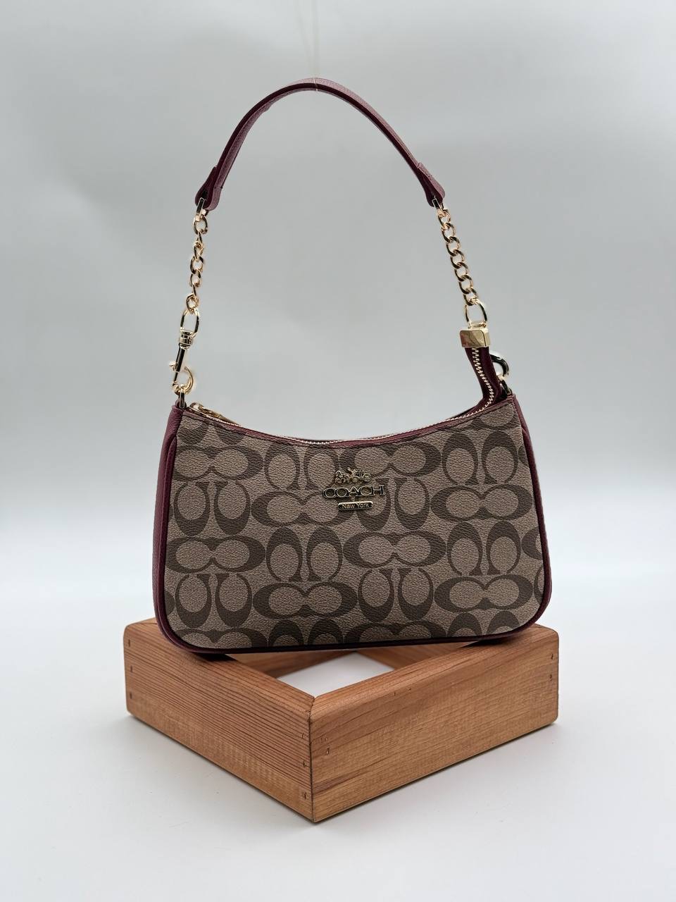 Coach monogram baget bordo vizon çanta