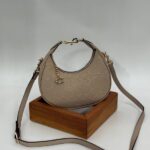 Coach Gofraj ay modeli orta boy vizon çanta